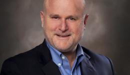 Photography studio headshot of Greg MacFarlane