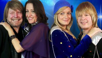 Group of singers dressed as ABBA