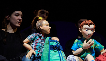Two puppeteers with puppets in Blue Marco