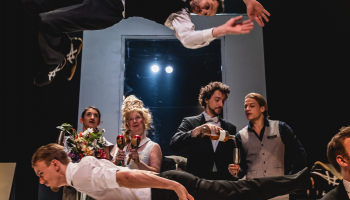 Group of acrobats performing in La Galerie