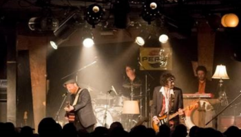 Musicians on stage performing the Last Waltz NB