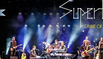 Classic Albums Live band performing on stage with their logo and Supertramp overlaid on the image
