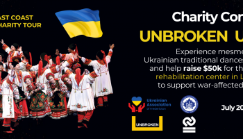 A large group of people dressed in traditional Ukrainian outfits with their arms raised with the words Charity Concert Unbroken Ukraine on the right.