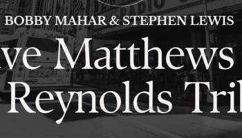 The words Dave Matthews & Tim Reynolds Tribute in white lettering over a black and white image of a street.