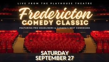 The words, 'Fredericton Comedy Classic' in shiny yellow script over an image of a Theatre with red seats.