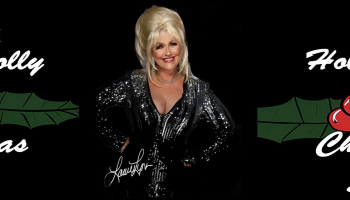 An image of Laurie Lynn dressed as Dolly centered. The words, 'Holly Dolly Christmas show' in white on either side of them.