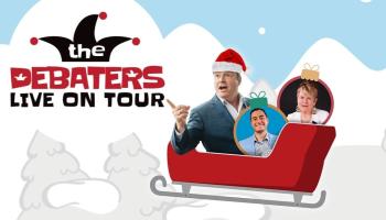 The Debaters sit in a Christmas sleigh
