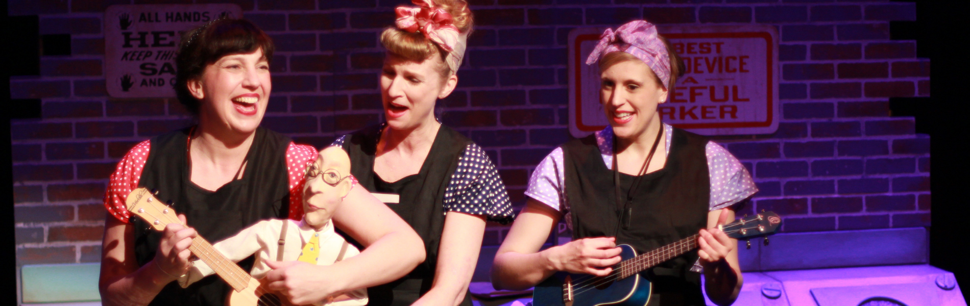 Three performers with a puppet in Somebody Loves You Mr.Hatch