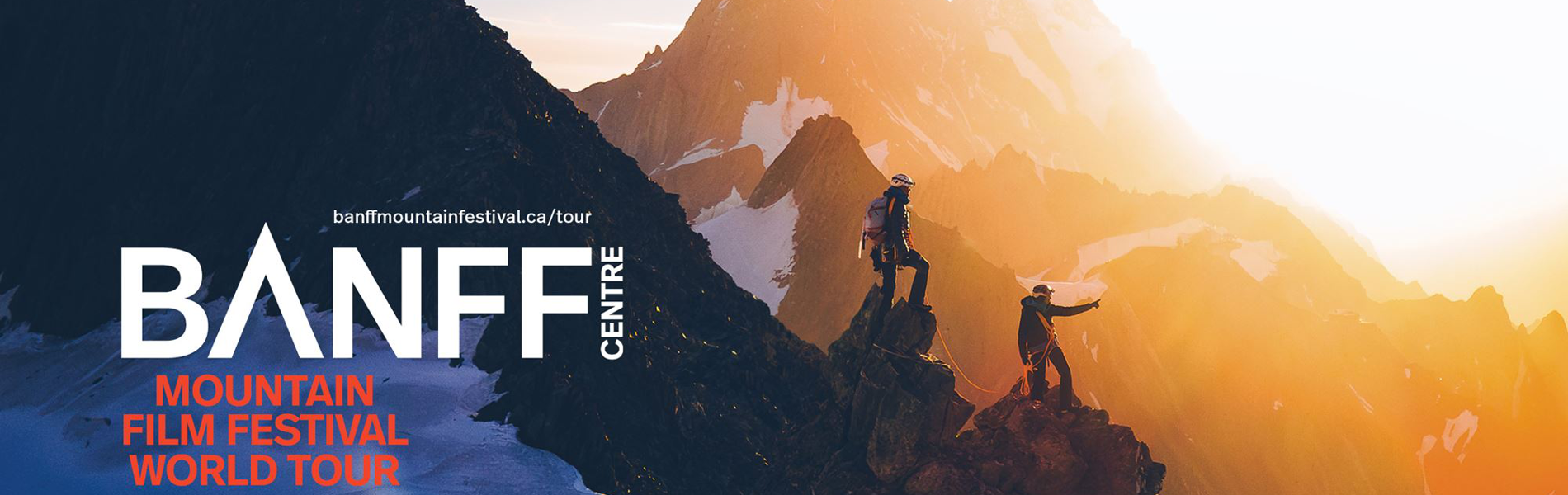 An image of a beautiful Mountain setting with 2 silhouettes climbing on it. The words, 'BANFF Centre Mountain Film Festival' along the bottom.