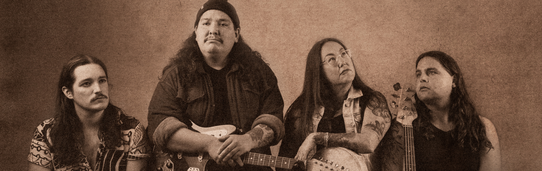 The four members of the Hello Crows in a sepia-toned photo