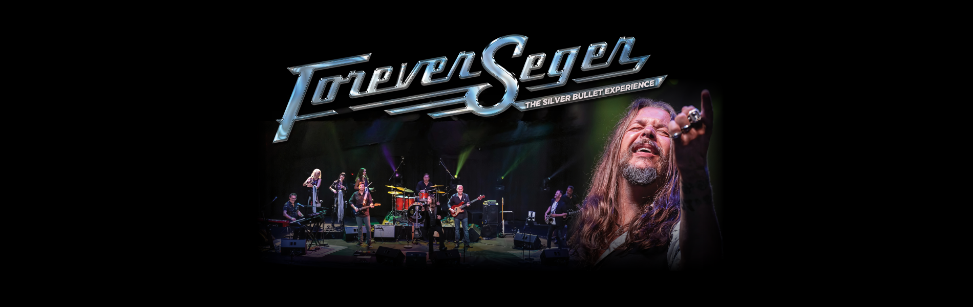 The words, 'Forever Seger The Silver Bullet Experience' in silver lettering above a band on stage and the tribute artist pointing into the distance. 